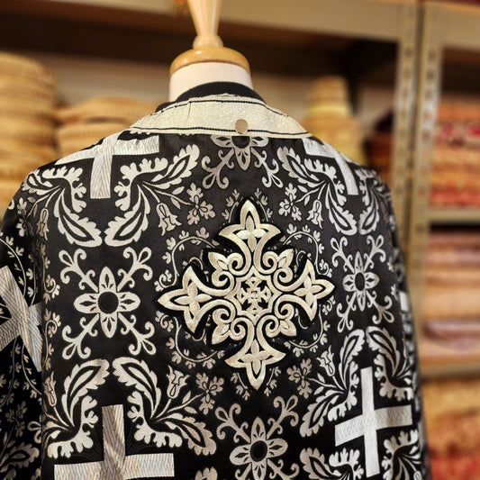 Greek orthodox priest vestments in black and white brocade