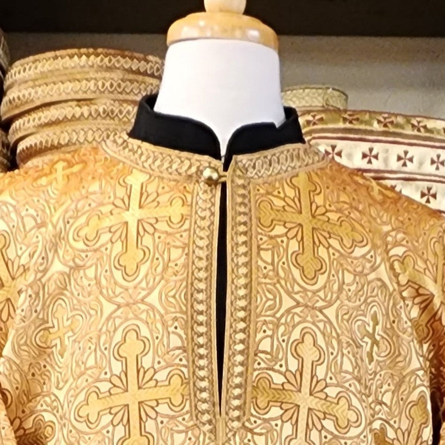 Closeup of Greek Orthodox liturgical garment made from gold brocade