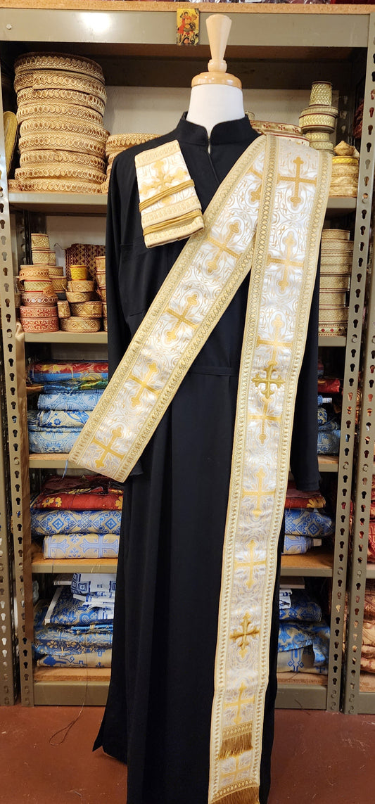 Greek Orthodox deacon orarion and cuffs on tailors form with black cassock